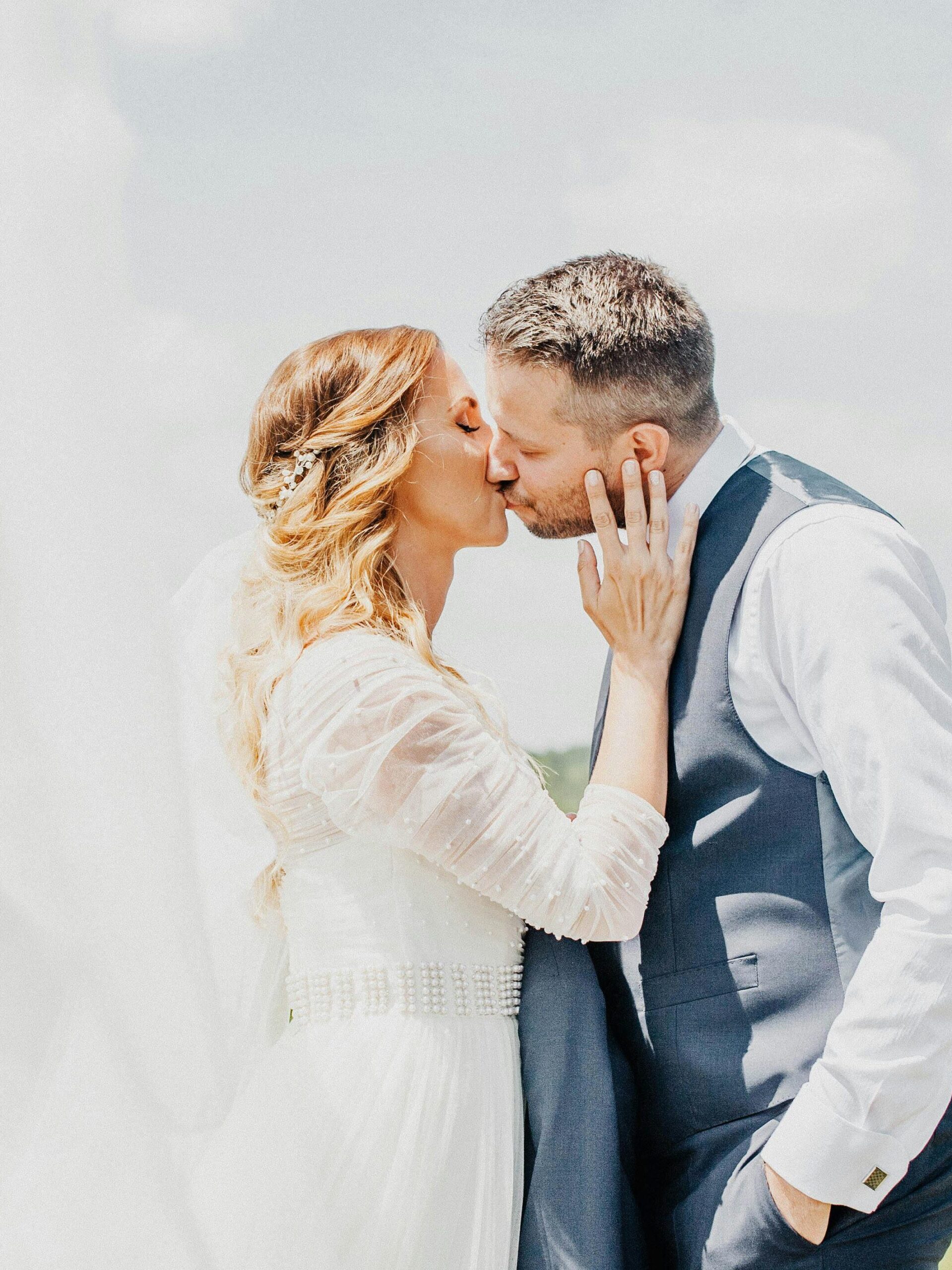 bride and groom kissing